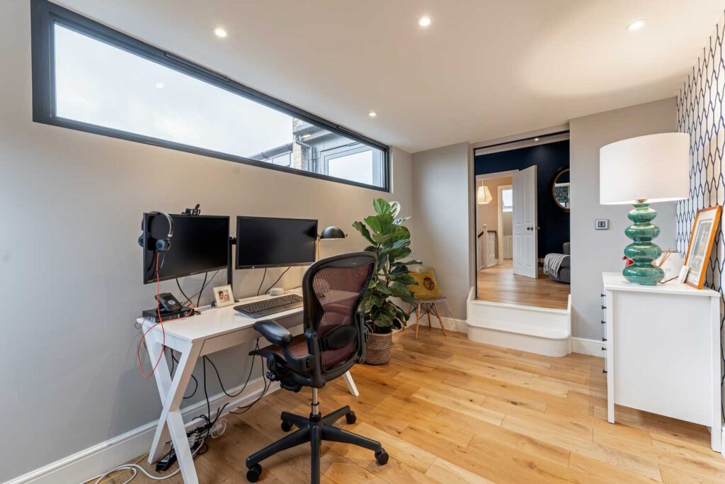 computer in study in an L shape loft conversion